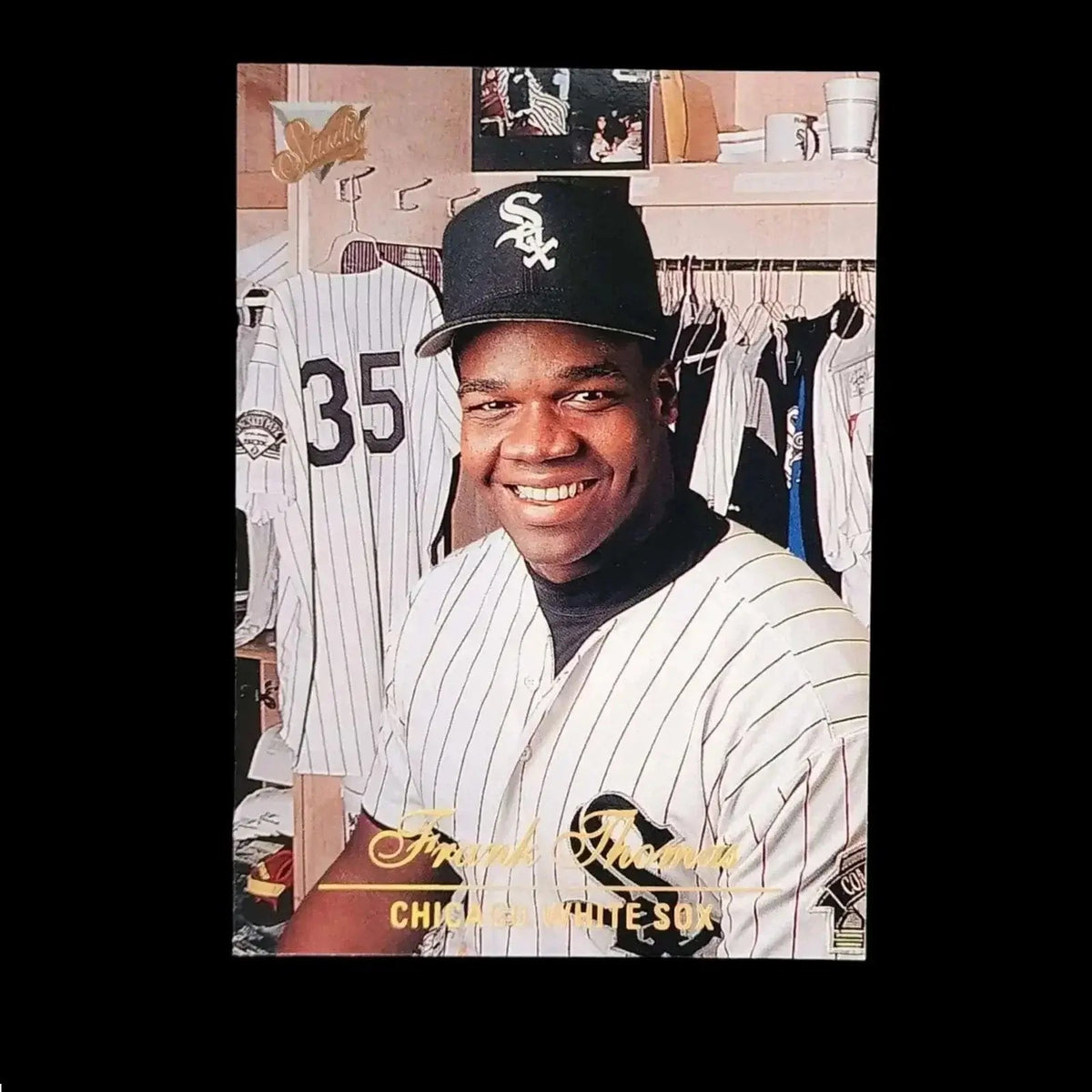 Collectible baseball card showing Frank Thomas in a white sox uniform.