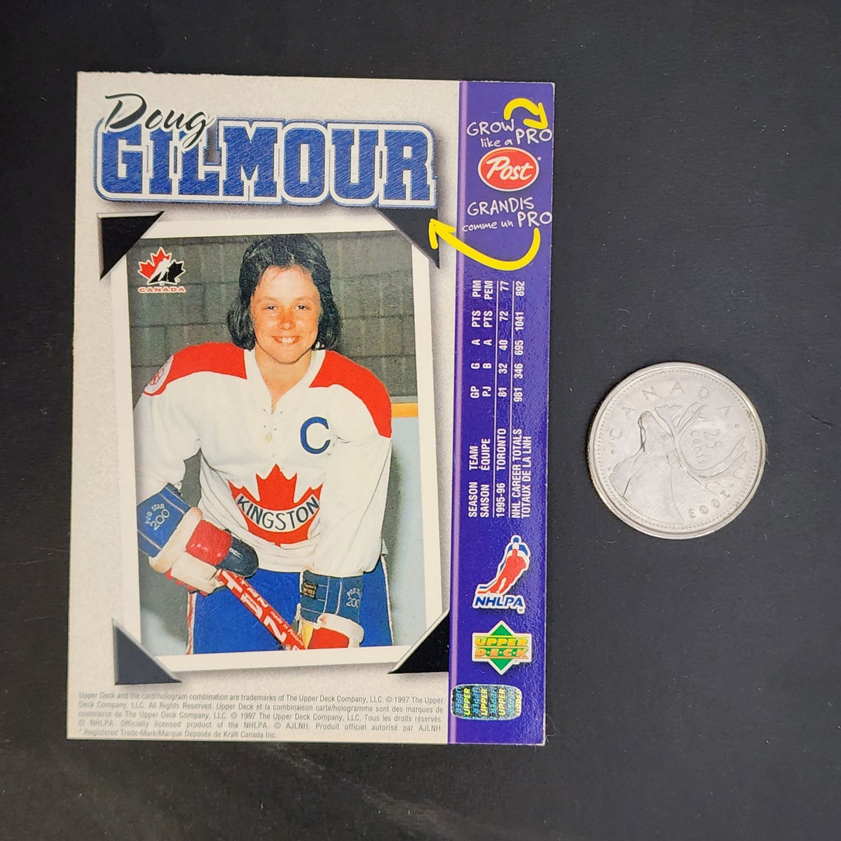 Doug Gilmour hockey card - A trading card featuring Doug Gilmour, a professional hockey player.