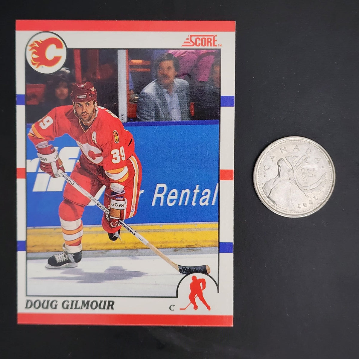 Doug Gilmour hockey card - A trading card featuring Doug Gilmour, a professional hockey player.