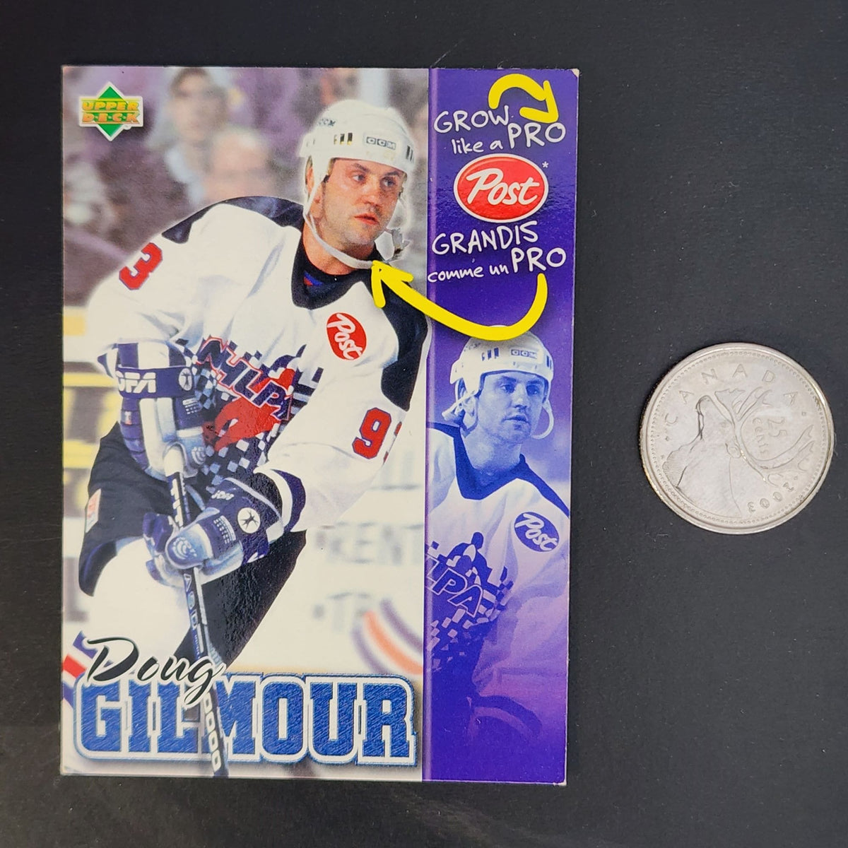 Doug Gilmour hockey card - A trading card featuring Doug Gilmour, a professional hockey player.